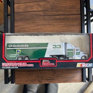 Green and White Model Transit Vehicles